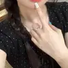 Al por mayor transfronterizo Verano Modal Elegante Delgado Encaje Lunares Hombro Derecho Manga Corta Camiseta Mujer Dulce Top Corto