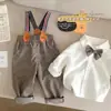 Direto da fábrica novo suspensórios gravata borboleta infantil pequeno conjunto de duas peças cavalheiro coreano xadrez príncipe camisa branca geração cabelo