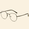 Nueva montura de gafas irregular de alambre de pie de acero plástico, montura de gafas de metal retro, tendencia literaria pequeña y fresca, espejo plano