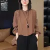 La popular camisa francesa de este año con temperamento, que reduce la edad, elegante, de manga larga para mujer, top único y hermoso, tacto de alta gama, moderno
