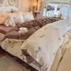 Conjunto de cama de gaze dupla nublada de quatro peças 2026 novo estampado estilo ins conjunto de cama de três peças para dormitório estudantil quarto