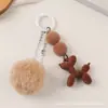 Chaveiro Pingente de Cachorrinho Fofo para Carro DIY Acessórios Criativos Coloridos de Bola de Veludo Acessórios para Capa de Fone de Ouvido