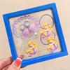 Pulsera infantil de sirena de nueva celebridad en línea, linda concha, clip de oreja sin dolor, anillo de pelo de princesa sirena, traje, caja de regalo