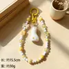 Colgante de pato de moda con lazo, cuentas de queso, llavero, correa para teléfono, accesorio para bolso, accesorio de bricolaje, regalo
