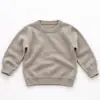 2026 Nuevo Suéter de Punto Texturizado Cuello Redondo para Niños y Niñas Color Sólido Holgado Manga Larga Suéter Ropa Exterior Ropa Infantil