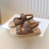 Sandalias para Niños 2025 Otoño Nuevo Estilo Niños y Niñas Versión Coreana de Una Tira Zapatos de Playa Hebilla Metálica con Forma de Sol Sandalias Birkenstock