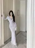 Vestido largo bodycon de color liso, escote Bardot, fruncido floral, puramente seductor, súper elegante, ajustado, de cintura alta, para mujer, otoño transfronterizo