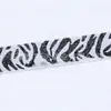 Venta al por mayor de fábrica En stock Banda elástica de felpa de 4 cm Banda elástica de pelo sintético de visón Banda elástica jacard con letras amigable para la piel