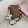 Bolsa Saco de Padrão Trançado de Nicho de Luxo Novo Modelo 2026 Bolsa Transversal Pequena Feminina Versátil Casual para Celular