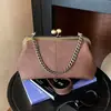 Bolsa de ombro nova moda outono 2026 transfronteiriça, bolsa transversal versátil e simples com corrente, bolsa de mão estilo clutch