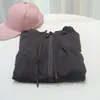 Ropa nueva de yoga otoño e invierno popular para mujer chaqueta con capucha de color liso cárdigan con capucha casual para deportes running nocturno yoga