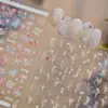 Tomoni Adesivos Finos e Flexíveis para Unhas Estilo Passeio de Primavera Adesivos Florais para Unhas Orquídea do Vale Oco Adesivos Decorativos Fabricante