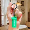 Chaveiro de Mini Garrafa de Água Fofo Popular Transfronteiriço, Pingente Fitness, Peça de Haltere Barra para Decoração de Mochila, Chaveiro