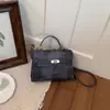 Bolso de hombro casual de color liso a la moda transfronterizo 2026 nuevo estilo elegante para commuters bolso de mano retro bolso cruzado pequeño cuadrado