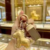Venta Directa de Fábrica: Año del Caballo 999 Oro Puro Llavero de Caballo, Potro Dorado, Flor de la Riqueza, Colgante para Teléfono, Adorno para Bolso