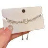 Pulsera extensible de concha de estrella y luna de estilo nicho, piedra ojo de gato, accesorio de mano de estilo vintage, joyería de lujo ligero de alta gama para mujer
