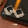 Pendientes Cuadrados de Hoja con Baño de Oro Real en Plata Aguja Pendientes Estilo Fresco Elegante Europeo y Americano Pendientes de Nicho de Gama Alta Venta al por Mayor