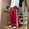 Pantalones deportivos de tres rayas de estilo americano de alta resistencia para hombre, pantalones finos de otoño de pierna ancha, pantalones casuales rectos holgados
