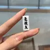 Hueso de camello tacto de amor marca de pescado texto accesorios de juego colgante joyería DIY hombres y mujeres con venta al por mayor
