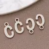 Acero Inoxidable Galvanizado Estilo Europeo y Americano 26 Letras Inglesas Etiqueta Colgante Pulsera Collar DIY Hecho a Mano Accesorios de Joyería