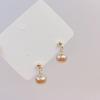 Exquisitos pendientes de perlas de alta gama de estilo socialité de Hong Kong, ligeros pendientes de temperamento rojo de red de moda de lujo, pendientes de estilo Chanel de lujo