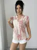Nuevo top de estampado de tinta transfronterizo europeo y americano con cuello en V, hombros con dobladillo, corte holgado, adecuado para ir al trabajo y para vacaciones, versátil de manga corta