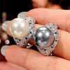 2024 Nuevo Zhuangshengsheng Joyería Base de Cobre Chapado en Oro Perla de Imitación Moda Anillo de Lujo Incrustado con Diamantes 14mm