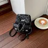 Mochila Pequeña de Cadena Acolchada tipo Chanel con Diamantes para Mujer 2026 Nuevo Bolso de Mano Versátil Casual de Gama Alta de Nicho Mochila Pequeña