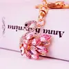 Joyas de cristal pedrería cisne blanco llavero de coche accesorios para bolso de mujer llavero colgante de metal pequeño regalo 1137