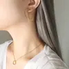 Celebridad de Internet europea y americana con anillo, collar y pendientes de cáñamo chapados en oro y acero de titanio de venta transfronteriza, conjunto de joyas personalizadas de estilo frío.