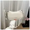 Bolso pequeño plateado de alta gama a la moda para mujer, nuevo modelo 2026, bolso de axila de nicho de lujo ligero, bolso cruzado exquisito de verano