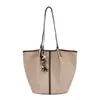 Bolso de mano grande informal de estilo coreano, nuevo para principios de otoño de 2026, bolso de playa para vacaciones, bolso de hombro único y elegante