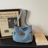 Bolsa Jeans Feminina 2026 Verão Nova Retro Simples Estilo Hong Kong Unissex Bolsa de Ombro Casual Estudante Bolsa Transversal