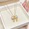 Accesorio de collar con lazo transfronterizo de cobre con microincrustaciones de circonita para mujer, lujo ligero, versátil, moderno, de nicho, accesorio que no se decolora