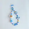 Llavero Colgante para Mochila de Pareja Linda de Dibujos Animados Creativos de Crayon Shin-Chan Genuino Colgante de Cadena para Teléfono Móvil Regalo Venta al por Mayor