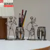 Porta plumas de músico de banda de hierro forjado vintage, decoración casera creativa hecha a mano, escritorio de sala de estar, en stock, venta al por mayor