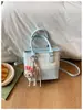 Bolso pequeño de cuadros simple transfronterizo para mujer, nuevo bolso cruzado de moda 2026 con textura, bolso de mano tipo cesta, bolso tipo cubo