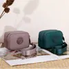 Bolsa de Moedas Nova Portátil de Nylon Transfronteiriça Mini Bolsa de Armazenamento para Batom e Fones de Ouvido Porta-Cartões Pequeno Multicamadas Bolsa de Armazenamento Resistente à Água
