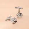 Europa y Estados Unidos transfronterizos nuevo giro gemelos moda simple variedad de aleación multicolor metal uñas de manga fabricantes al por mayor