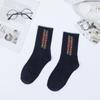 Calcetines de tubo transpirables con letras absorbentes de sudor para primavera y verano para mujer, calcetines de moda, fabricantes al por mayor