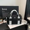 2026 Nueva Moda Bolso de Hombro Único Estilo Coreano para Mujer Alta Apariencia Bolso de Mano Tipo Almohada Casual Ligero para Viaje Bolso Cruzado