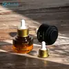 Em estoque Frasco conta-gotas de fundo grosso de 30ml Frasco de óleo essencial Frasco de recarga portátil para viagem Frasco de sérum Frasco de vidro de formato irregular Frasco vazio