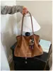 Bolso de mano casual retro de gamuza, nueva colección 2026, bolso versátil para el día a día para mujer, moderno y de gran capacidad