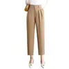 Pantalones de traje cropped plisados en caqui y negro, pantalones tipo harén holgados y estilizados, adecuados para ir al trabajo, con un diseño fluido y casual