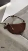 Cuerno de piel de oveja puede cantar paquete de dumplings 2025 nuevo diseño nicho monedero bolso de hombro mensajero para mujer venta al por mayor