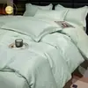 Nuevo Conjunto de Cuatro Piezas de Algodón Tencel de Lujo Ligero Conjunto de Tres Piezas Jacquard de Color Sólido de Algodón Lycra Sábana Bajera Funda de Edredón de Gama Alta Regalo Dropshipping