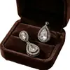 Brincos de zircônia em formato de gota de alta qualidade, da Ziyu, elegantes e da moda, para mulheres, perfeitos para combinar com vestidos de noiva e trajes formais, com aparência cintilante