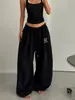 Calça larga estilo retro americano para mulheres, adequada para primavera e outono, com cordão, tecido fluido, estilo casual, corte solto, perfeita para dança de jazz, e design de comprimento total
