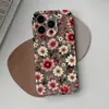 La funda dura de cobertura total más vendida de TEMU para iPhone 17, con base gris retro y estampado floral rosa por toda la superficie, funda de teléfono de una sola capa 16pro