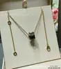 Colar de mola pequena Baojia versão de luxo V dourado, versão de luxo CNC, modelo de caridade de celebridade, corrente para clavícula de cerâmica banhada a 18k